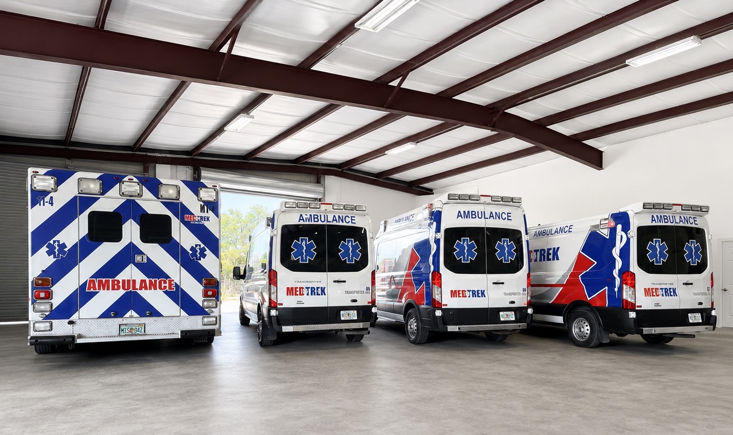 Medtrek ambulance fleet lined up inside the Naples garage